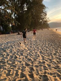 People playing on beach