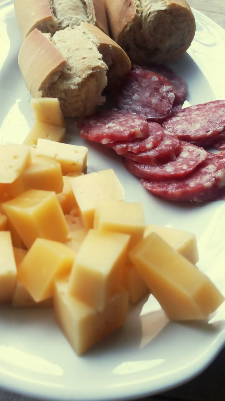 food and drink, cheese, food, dairy, cheddar cheese, pecorino romano, freshness, dish, meat, parmigiano-reggiano, plate, produce, slice, indoors, healthy eating, animal fat, processed meat, meal, no people, still life, vegetable, close-up, fruit, wellbeing, sausage, cuisine, salami, pork, ham, breakfast, italian food, cutting board, variation