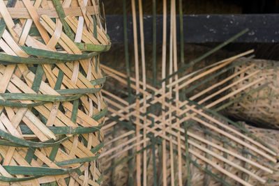 Close-up of stacked wicker basket