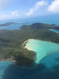 Scenic view of swimming pool by sea against sky