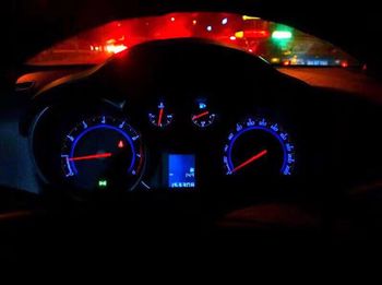 View of illuminated car on road at night