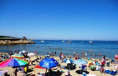 People enjoying at beach