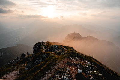 Scenic view of mountains against sky during sunset