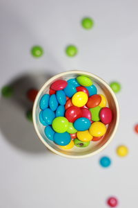 High angle view of multi colored balls on table