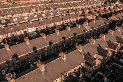 Aerial view of rooftop and streets of back to back terraced houses