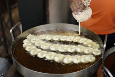 Close-up of vendor making jalebi