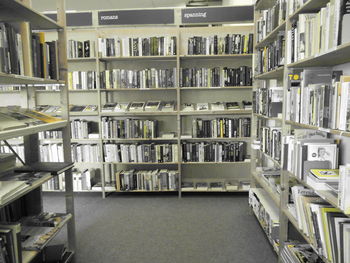 Row of books arranged in rack