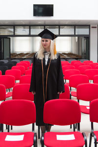 Rear view of woman in graduation