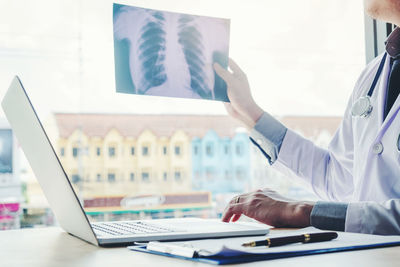 Man working on table in office