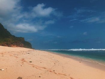 Scenic view of beach against sky