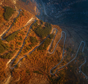 High angle view of winding road on land