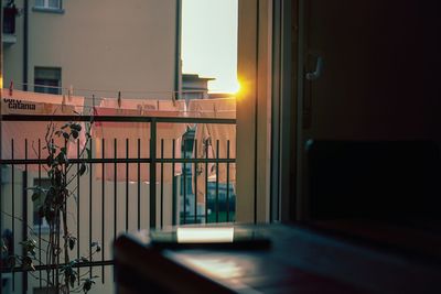 Sunlight streaming through window at sunset