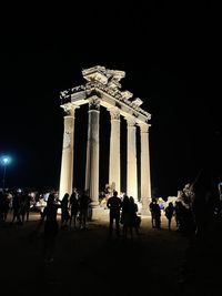 Group of people in front of historical building