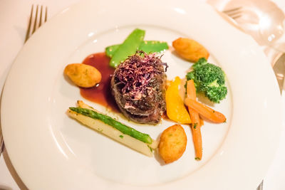 High angle view of food served in plate