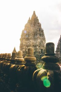 Ancient temple against building