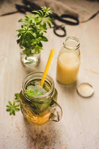 High angle view of drink in jar on table