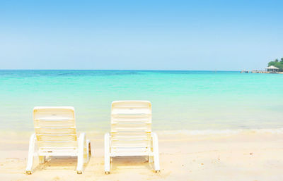 Scenic view of beach against clear sky