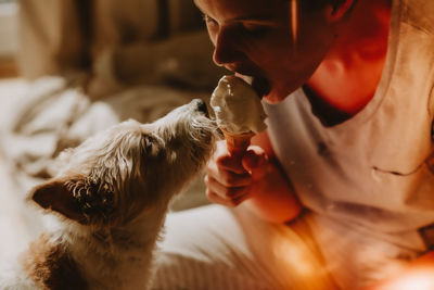 Side view of man with dog