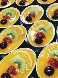 High angle view of orange fruits on table