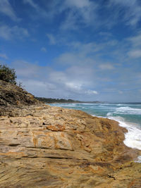 Scenic view of beach against sky