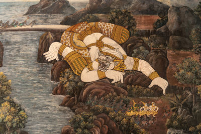 Golden giant in wat phra kaew mural