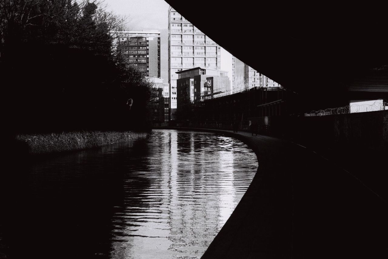 architecture, built structure, building exterior, water, reflection, city, the way forward, bridge - man made structure, building, diminishing perspective, connection, river, canal, railing, sky, transportation, day, vanishing point, tree, no people