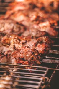 Close-up of meat on barbecue