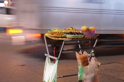 Table with food on footpath