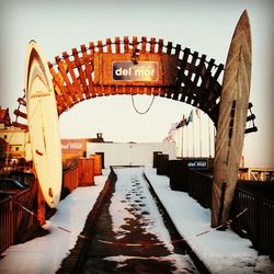 View of bridge over canal in city