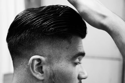 Close-up of man at home