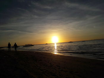 Scenic view of beach during sunset