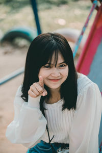 Portrait of a smiling young woman