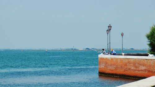 Scenic view of sea against clear sky