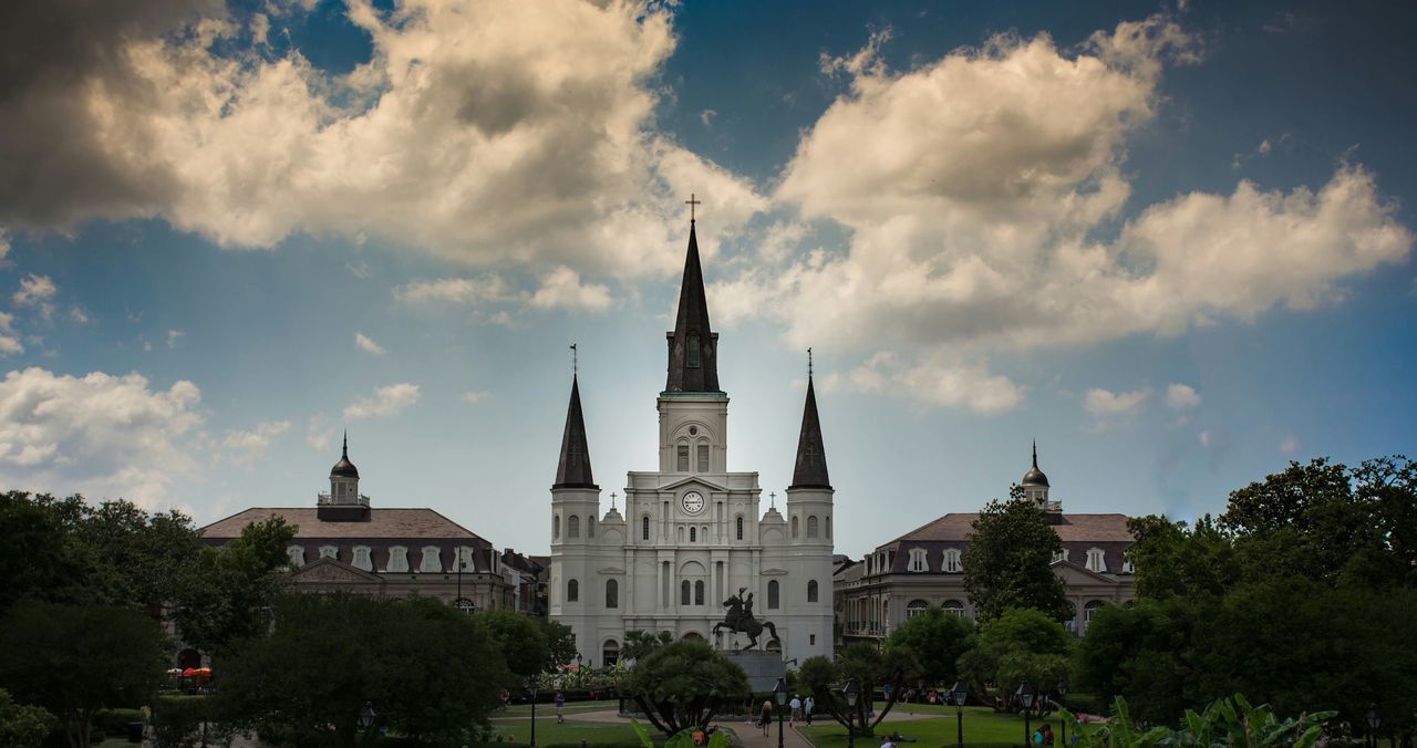 architecture, built structure, building exterior, sky, tree, cloud - sky, city, cloud, famous place, travel destinations, tower, travel, tourism, incidental people, low angle view, cloudy, day, capital cities, history, outdoors