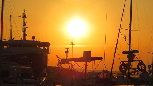 Silhouette of boats at sunset