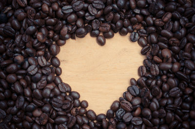 Close-up of coffee beans on table