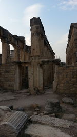 Low angle view of old ruin against sky