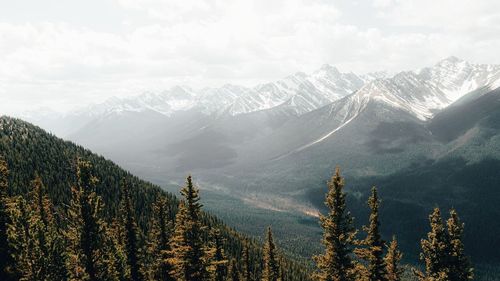 Scenic view of mountains against sky during winter