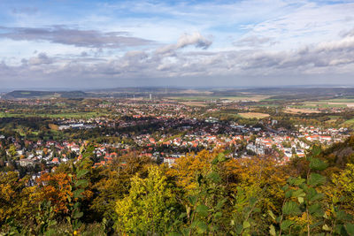 Aerial view of cityscape against sky