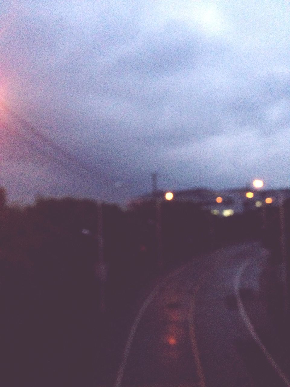 sky, weather, cloud - sky, illuminated, cloudy, dusk, night, transportation, overcast, road, street light, street, storm cloud, lighting equipment, outdoors, nature, no people, dramatic sky, cloud, sunset