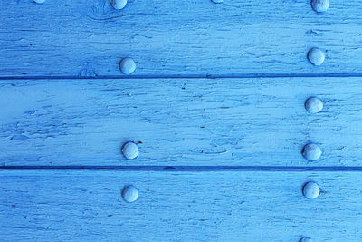 Full frame shot of weathered wooden door