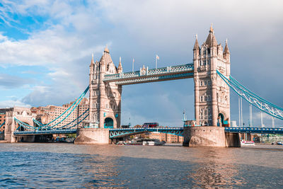 Iconic tower bridge view connecting london with southwark over thames river, uk.