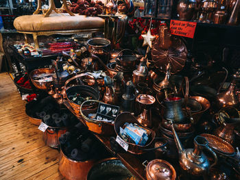 Close-up of antiques for sale at store