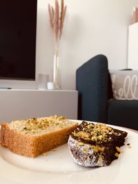 Close-up of cake served on table at home