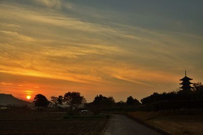 Road against sky during sunset