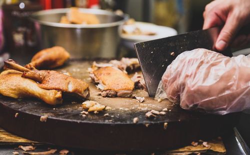 Close-up of person preparing food