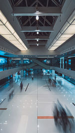 High angle view of illuminated escalator in city