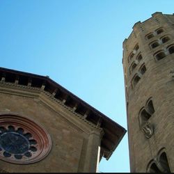 Low angle view of built structure against clear blue sky