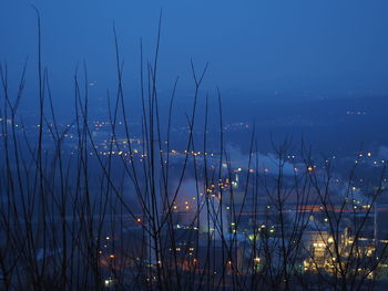 Scenic view of lake against sky at night