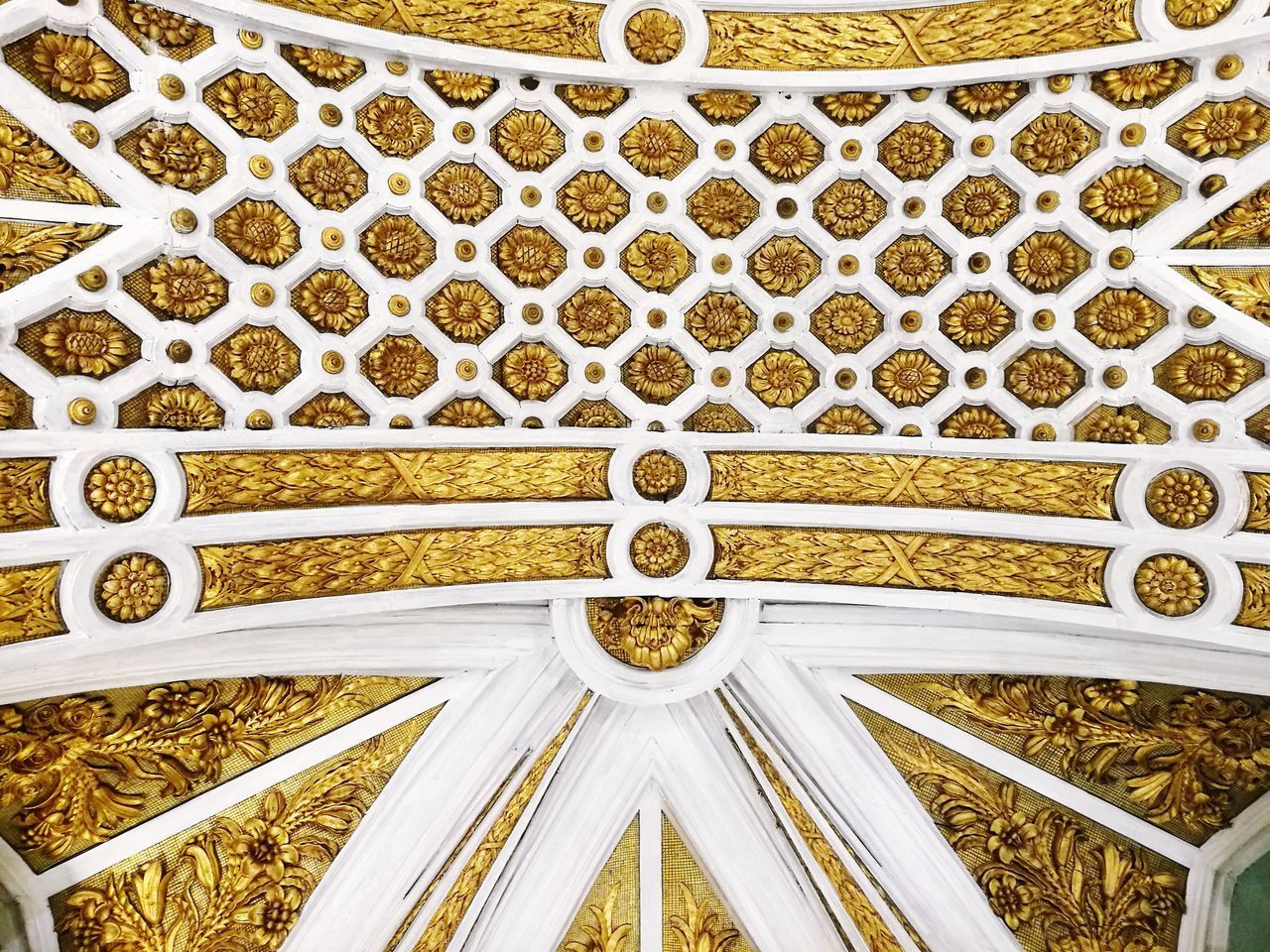 CLOSE-UP OF ORNATE METAL CEILING